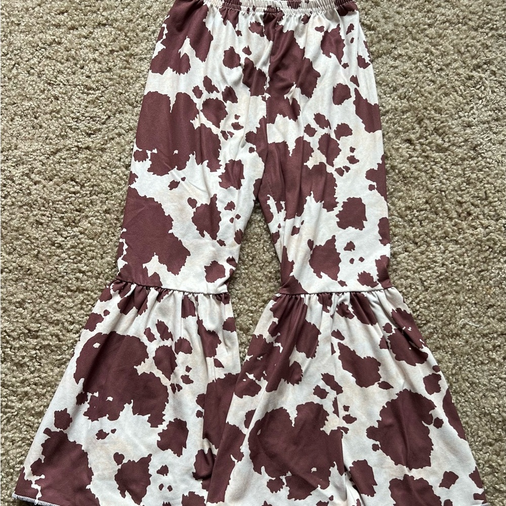 Brown and White Cow Print Flared Pants